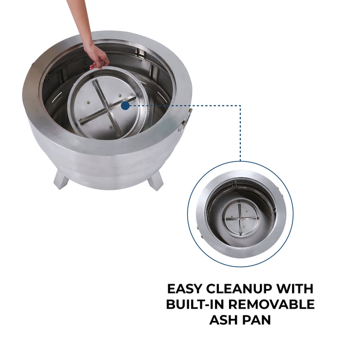A hand removing an ash pan from a circular metal fire pit. The image highlights the removable ash pan feature for easy cleanup.