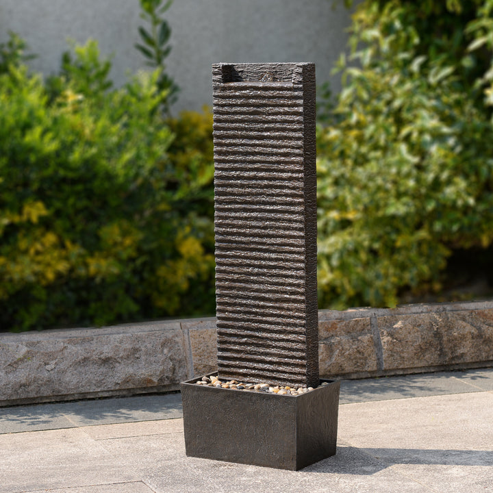 Ridged Texture Outdoor Water Fountain with Warm Glow Lighting