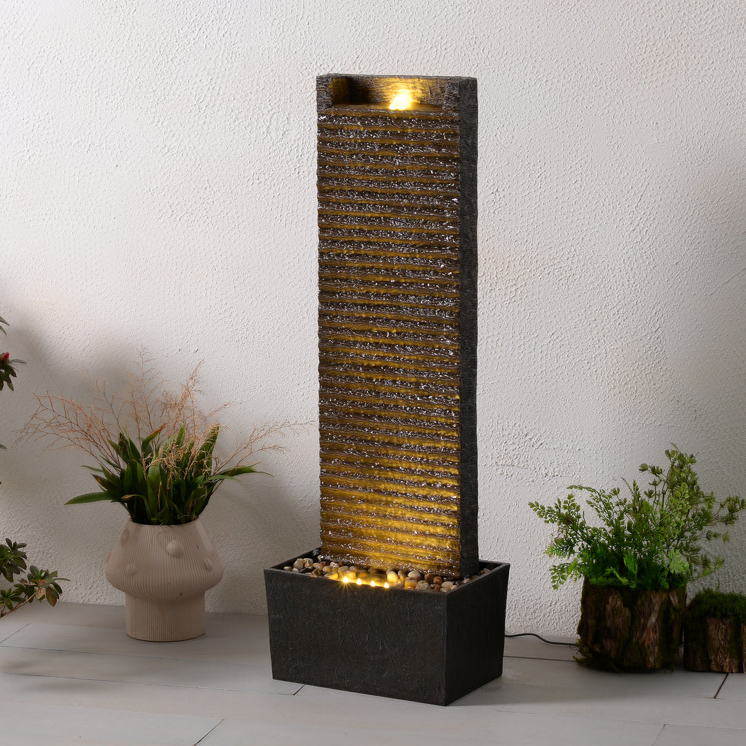 Ridged Texture Outdoor Water Fountain with Warm Glow Lighting